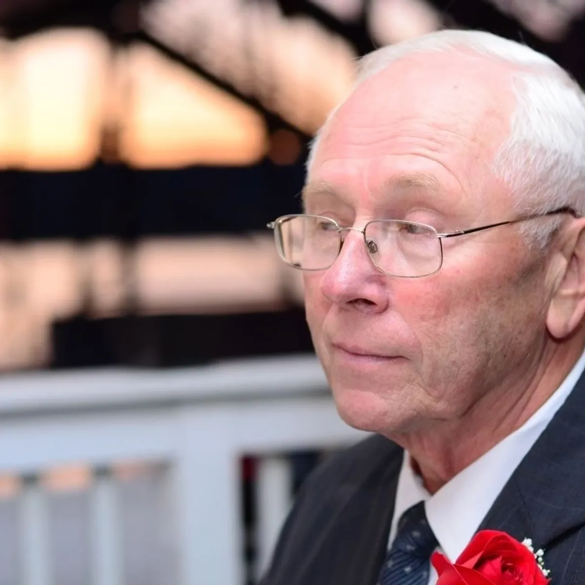 Thoughtful elderly man in formal attire